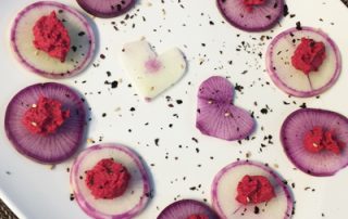 Beet hummus on radishes